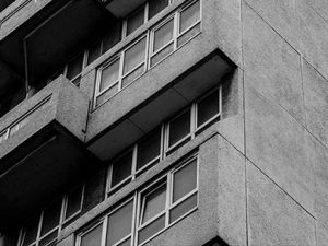 A black and white photo of a council estate.