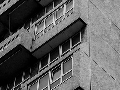 A black and white photo of a council estate