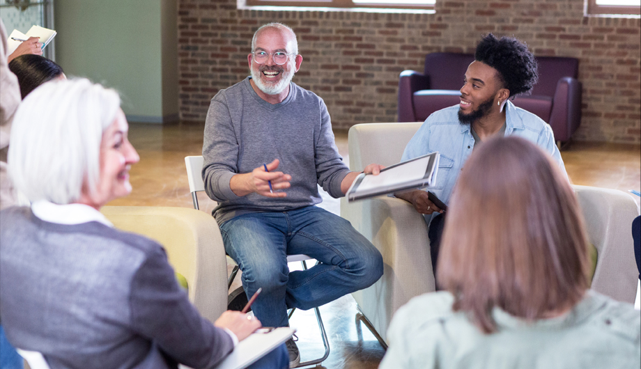 Group Meeting with white male and black male in group