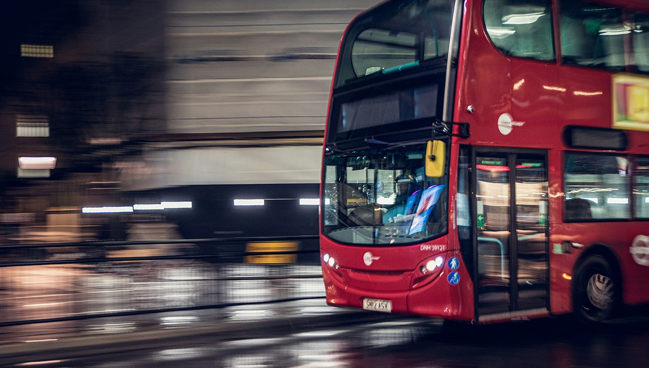 A London Bus driving at night